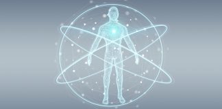 Mensch digital dargestellt, wie im Zentrum eines Atoms