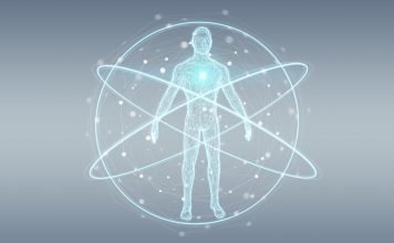 Mensch digital dargestellt, wie im Zentrum eines Atoms